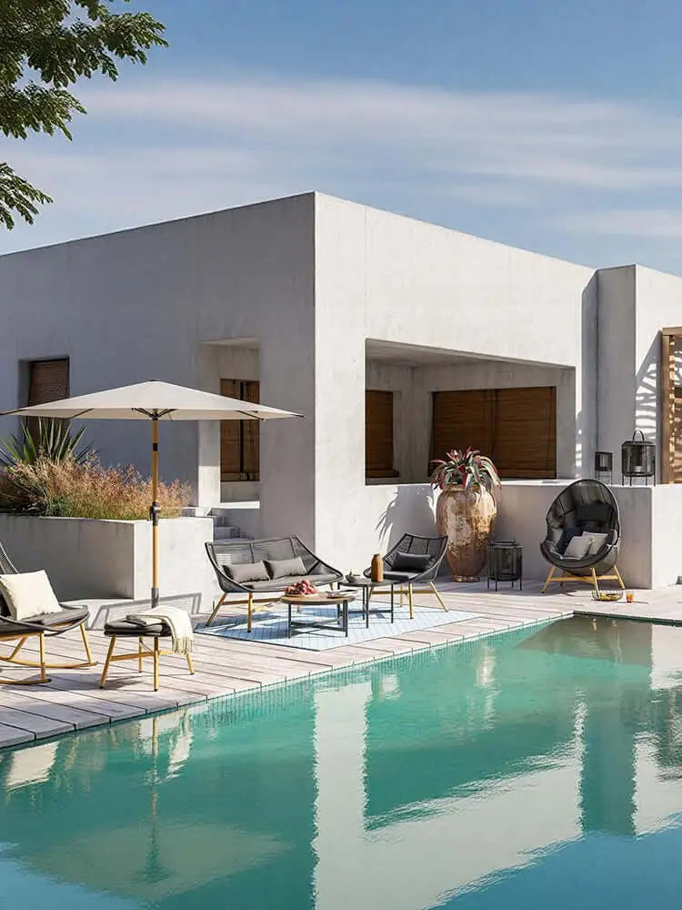 Modern outdoor patio with pool, chairs, and umbrella under a clear blue sky.