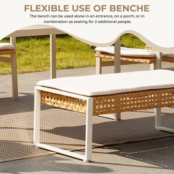 Outdoor bench with wicker seat and white frame on a patio, with text describing its flexibility.