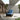 Grand Patio outdoor wicker sectional sofa with thick blue cushions, steel frame, and a modern patio setting.