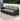 Grand Patio outdoor wicker sectional sofa with thick gray cushions and a steel frame, set on a patio surface.