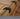 Close-up of a clip design on a wooden patio furniture set with 'GrandPatio' branding.