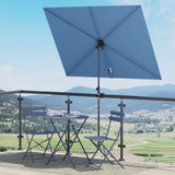 Rectangular flat patio market umbrella in light blue, positioned over a small round table and two folding chairs on a balc...