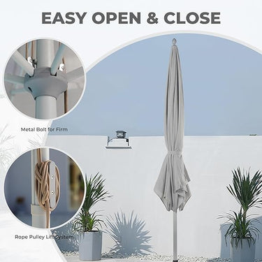 Grand Patio 11 ft sunshade umbrella with pulley lift, beige fabric, and metal components, set against a light background.