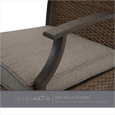 Close-up of a patio chair with an anti-rust coating on the metal armrest.