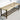 Wicker bench with wooden frame on a tiled floor