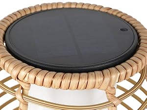 Round rattan table with a black solar panel on top