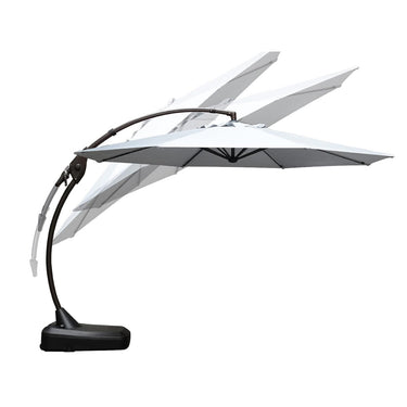 Grand patio 12 ft deluxe Napoli Sunbrella cantilever umbrella in gray, featuring an adjustable arm and sturdy base.