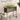 Powder-coated metal garden bed with wooden frame holding flowers on a neutral background