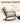 Rocking chair with a focus on its rocking design and angles.