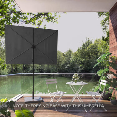 GRAND PATIO JENA 6x4 FT rectangular flat patio market umbrella in dark gray, set on a wooden deck by a green lake.