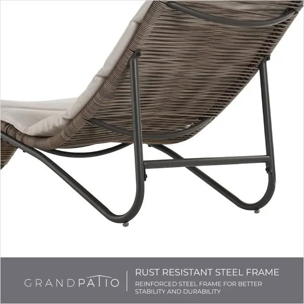 Brown wicker lounge chair with a rust-resistant steel frame on a white background, featuring the GrandPatio brand.
