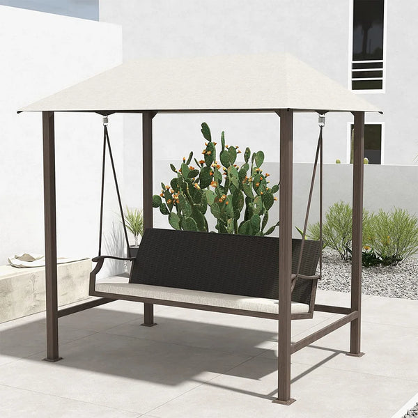 Outdoor swing with canopy in a modern patio setting with cacti in the background.