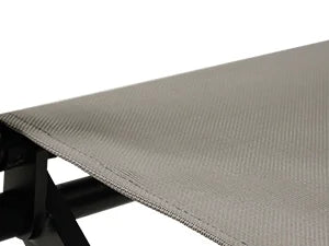 Textured fabric on a wooden surface with a white background