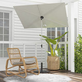 Grand patio Jena 6x4 ft rectangular flat patio market umbrella in light gray, positioned beside a rattan chair and plant.