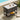 Outdoor serving cart with drinks and fruit by a poolside