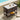 Outdoor serving cart with drinks and fruits by a poolside