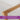 Bamboo rod with a purple text overlay on a white background