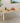 Wooden table with apples and wine glasses on a wooden deck