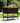 Outdoor patio cart with food and drinks on a grassy area