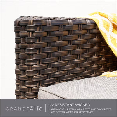 Wicker armchair with a yellow towel on a white background, featuring GrandPatio branding.