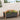 Gray planter box with wooden sides filled with colorful flowers on a wooden deck.