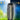 Solar-powered outdoor lamp with day and night icons on a grassy background