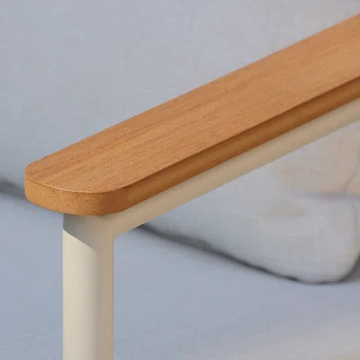 Wooden table edge on a gray background