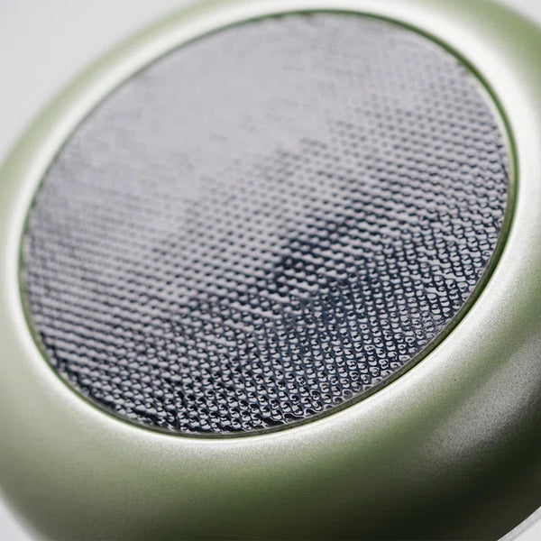 Close-up of a metallic object with a textured surface