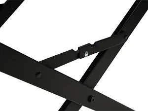 Close-up of a black metal frame with intersecting beams on a white background