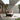 Grand Patio outdoor wicker sectional sofa with thick cushions, steel frame, and a modern design in a patio setting.
