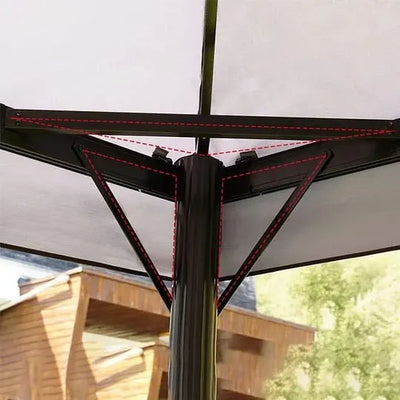 Close-up of a patio umbrella with a blurred outdoor background